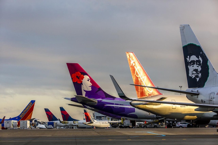 caption: The Seattle Port Commission oversees a vast transportation empire, which includes Sea-Tac airport and the working waterfront.