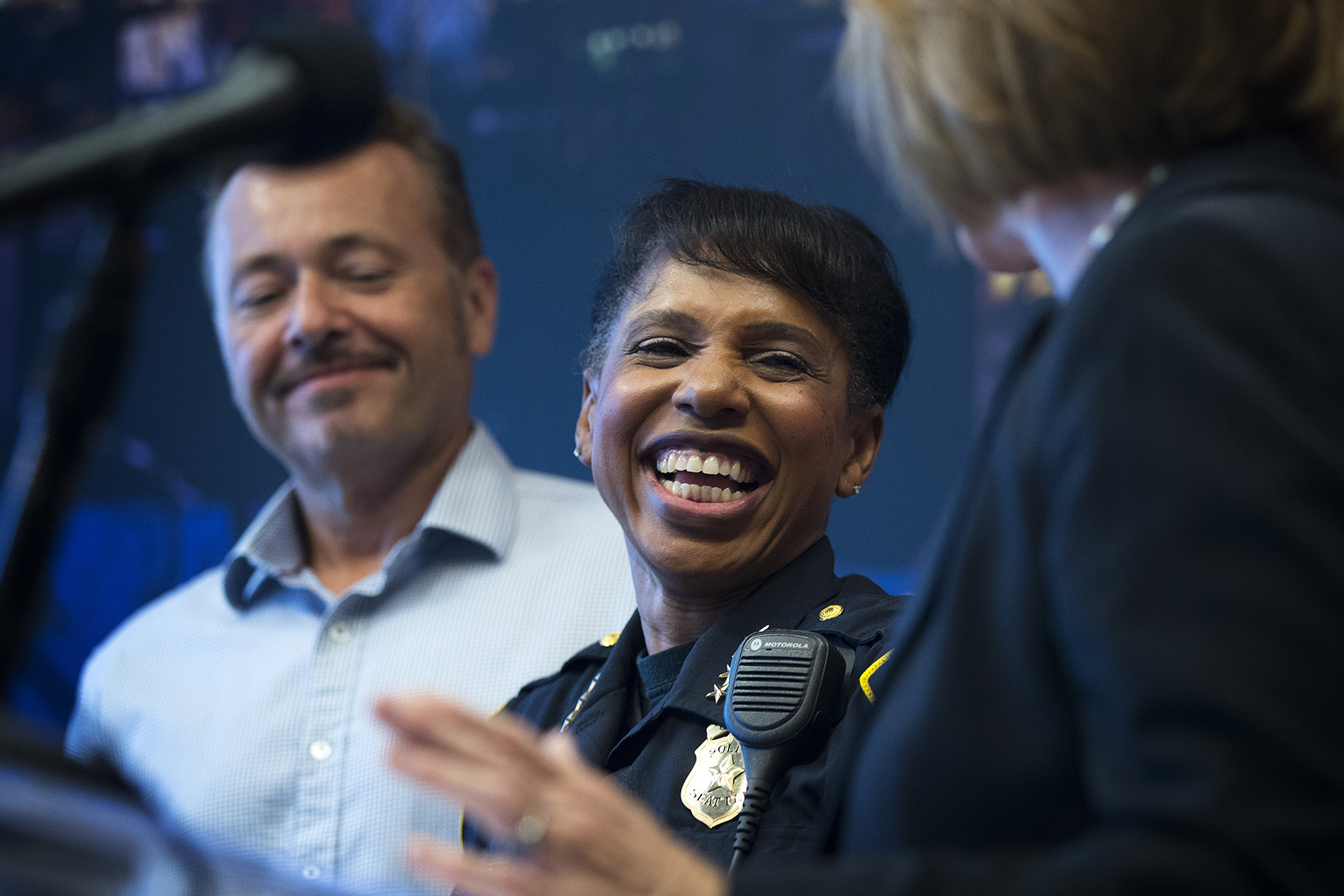 caption: Carmen Best, center, smiles while standing with her husband, left, and Seattle mayor Jenny Durkan, right, during a press conference on Tuesday, July 17, 2018, at City Hall in Seattle. Tap or click on the first image to see more. 