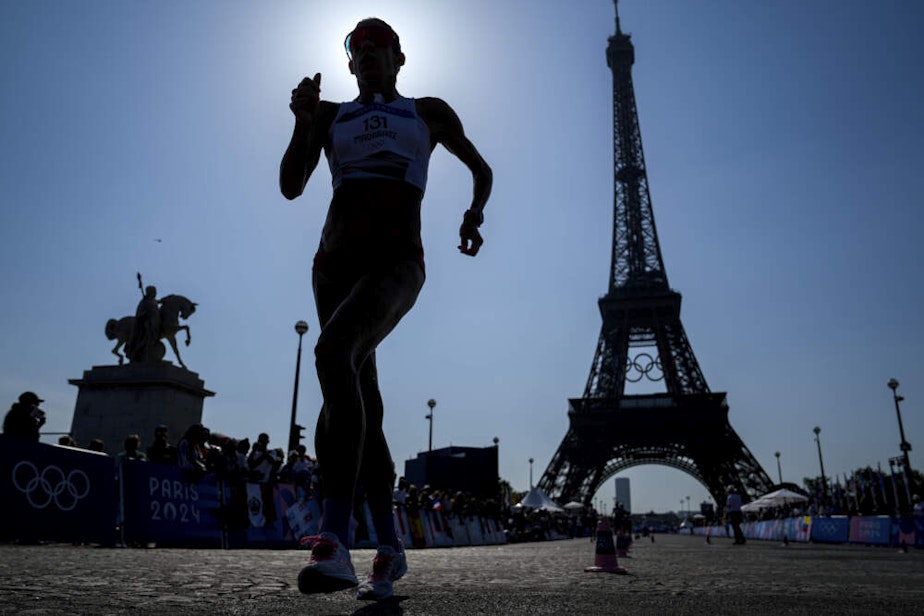 caption: Hungary's Viktoria Madarasz competes during the women's 20km race walk at the 2024 Summer Olympics. (Vadim Ghirda/AP)