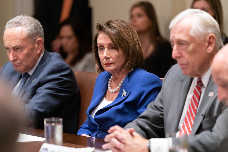 caption: Rep. Chuck Schumer, left, and House Speaker Nancy Pelosi, center, at a meeting on Thursday with President Trump. In a tweet, Trump said, "Do you think they like me?"
