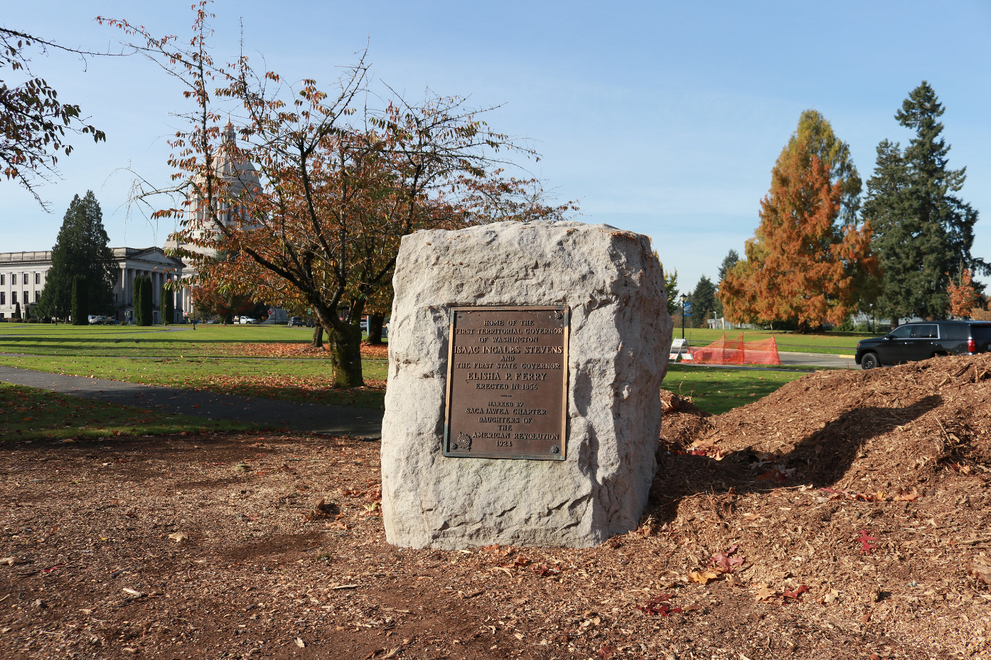 caption: This bronze plaque commemorating the location of the home of Washington's first territorial and state governors was stolen from the Capitol Campus earlier this month. Now the Washington State Patrol is seeking tips from the public.