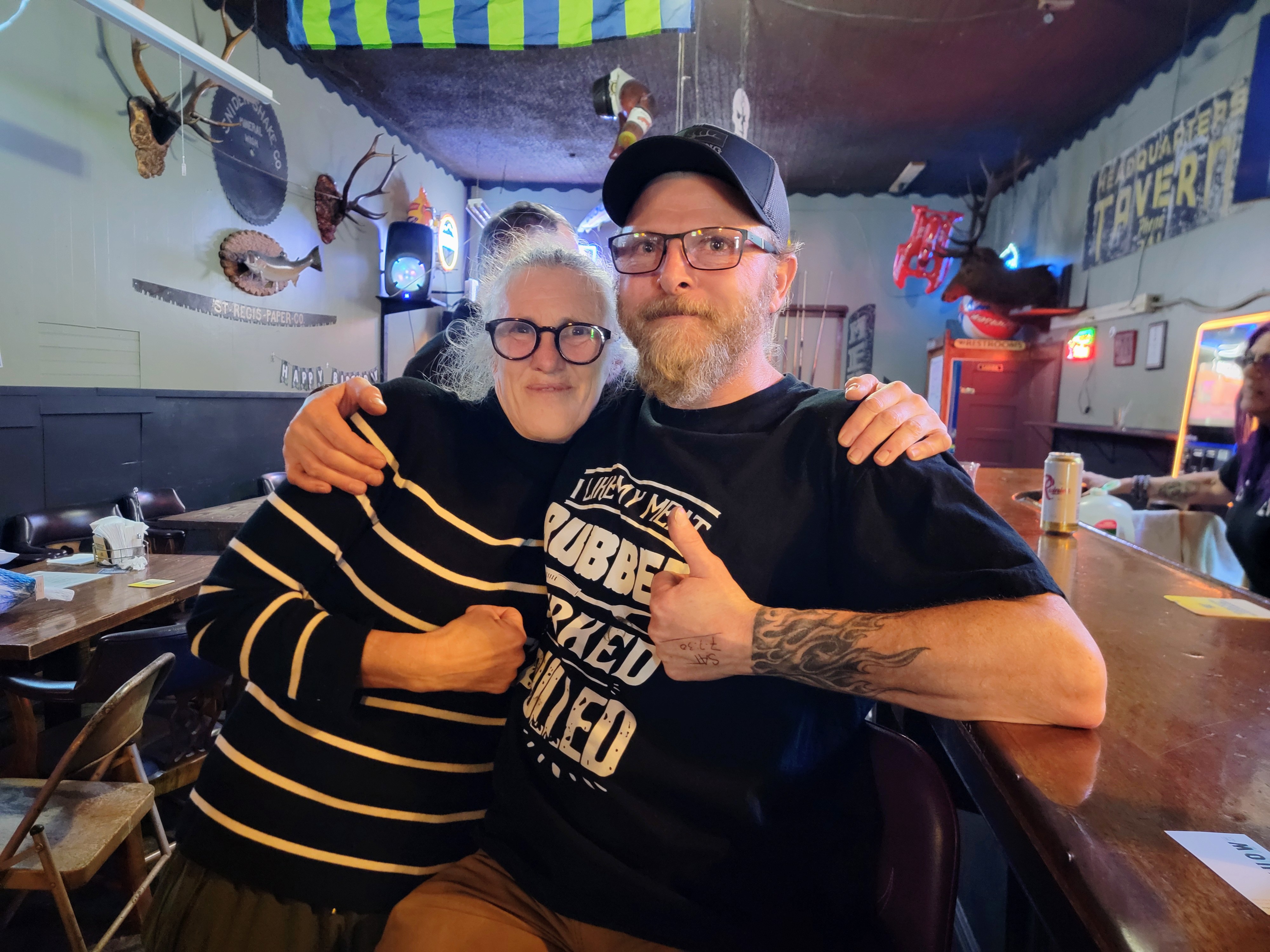 caption: Margot Page, left, and William "Wild Bill" Wing celebrate after a successful meat draw on Thursday, November 13, 2025.