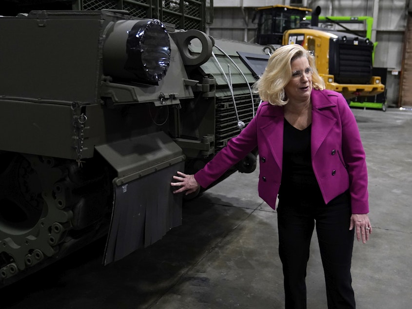 caption: Secretary of the Army Christine Wormuth looks over the latest version of the M1A2 Abrams main battle tank as she tours the Joint Systems Manufacturing Center on Feb. 16, 2023, in Lima, Ohio.