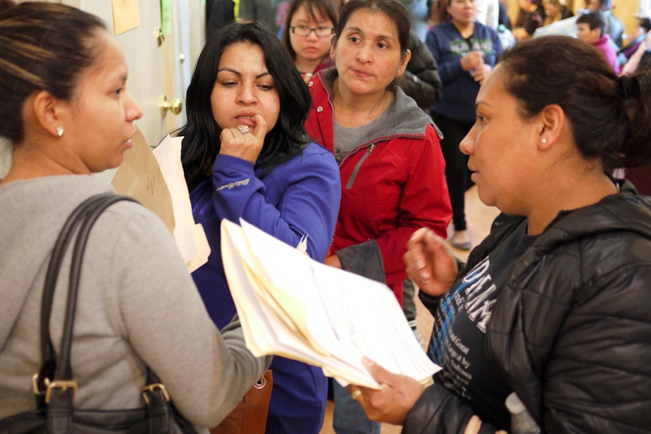 caption: A year ago, 1,400 people showed up for 110 affordable units on Beacon Hill.