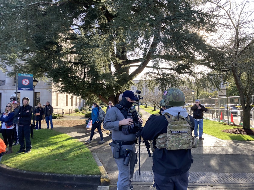 caption: The open carry of firearms and other weapons would be banned at the Washington Capitol and at permitted demonstrations under a bill that has passed the state Senate.