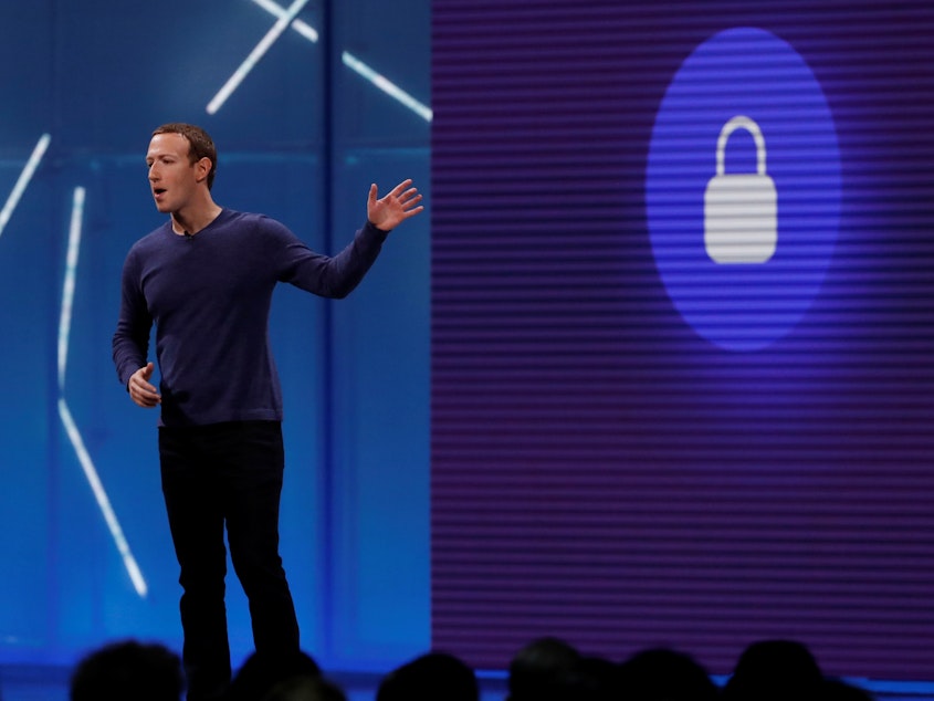 caption: Facebook CEO Mark Zuckerberg speaks at the company's annual developers conference in San Jose, Calif., May 1, 2018. Facebook is beginning to enforce a ban on white nationalist content.