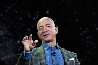 caption: Amazon founder and CEO Jeff Bezos announced he'll be on board a spaceflight next month, in a capsule attached to a rocket made by his space exploration company Blue Origin. Bezos is seen here in 2019.