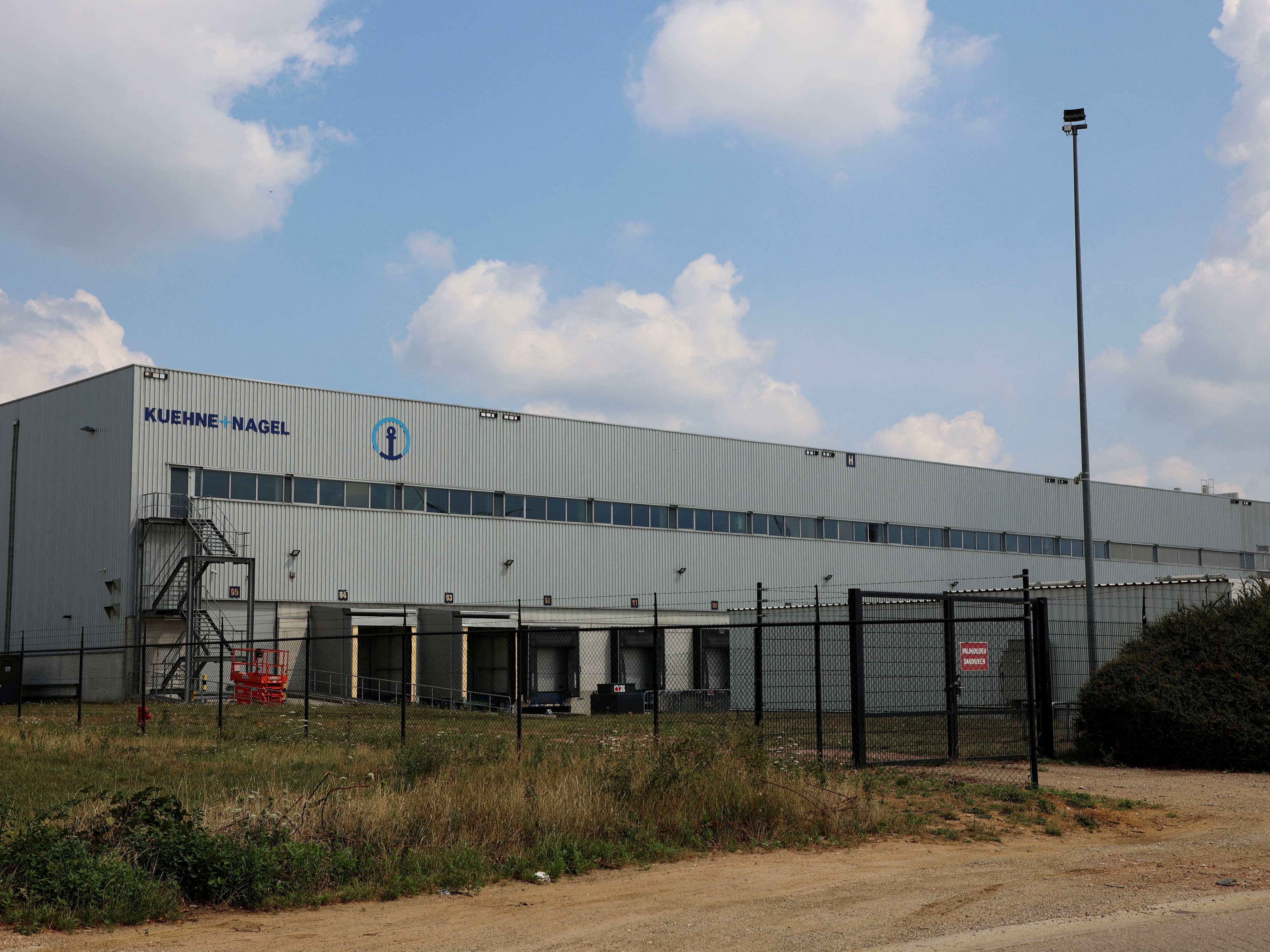 caption: A view of a warehouse of Kuehne+Nagel in Geel, Belgium, which houses U.S.-funded contraceptives worth nearly $10 million. The U.S. State Department has stated that the stocks would be sent to France to be destroyed.