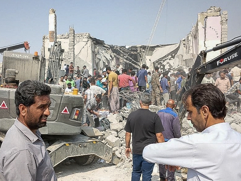 caption: This picture obtained from Iran's ISNA news agency shows the site of a strike on a girls' school in Minab, in Iran's southern Hormozgan province, on February 28, 2026.