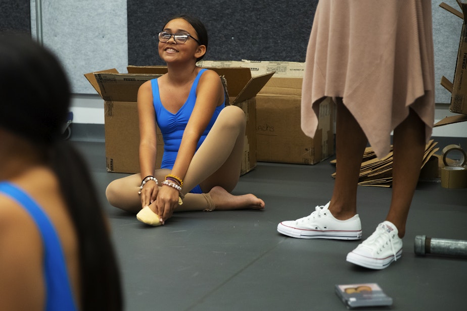 caption: Kaya Parker, 12, gets ready to be fitted for her first pair of pointe shoes on Tuesday, September 12, 2023, at the Pacific Northwest Ballet School in Bellevue.