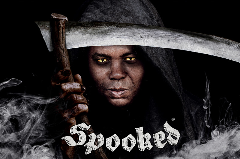 caption: Spooked host Glynn Washington