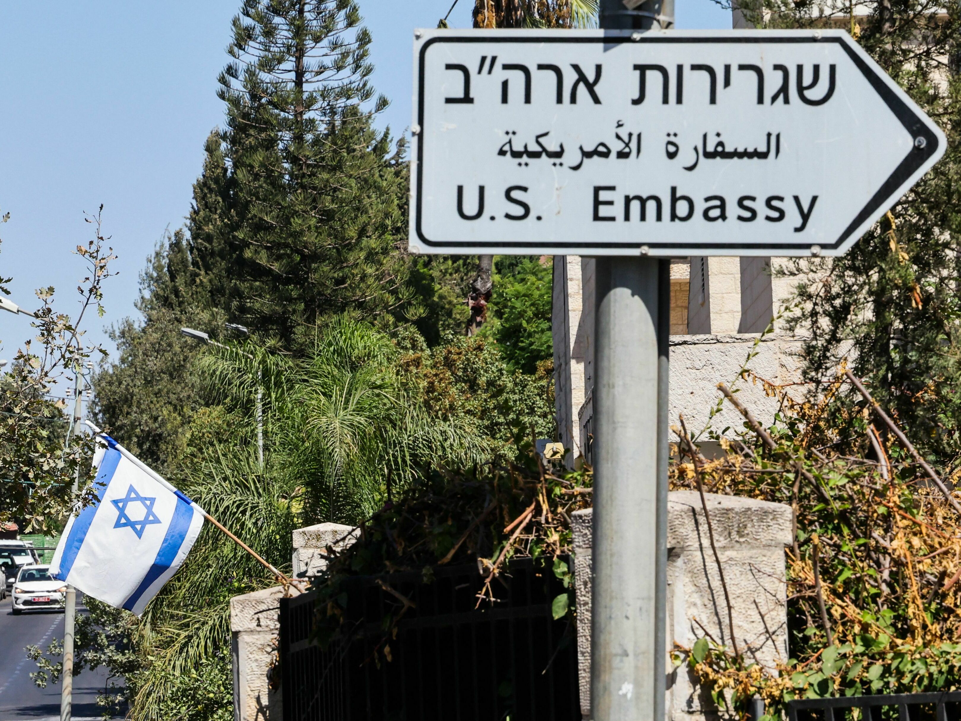 caption: A road sign points the way to the U.S. Embassy in Jerusalem, which does not currently have an ambassador, hampering diplomatic efforts to calm violence between Israel and Hamas militants.
