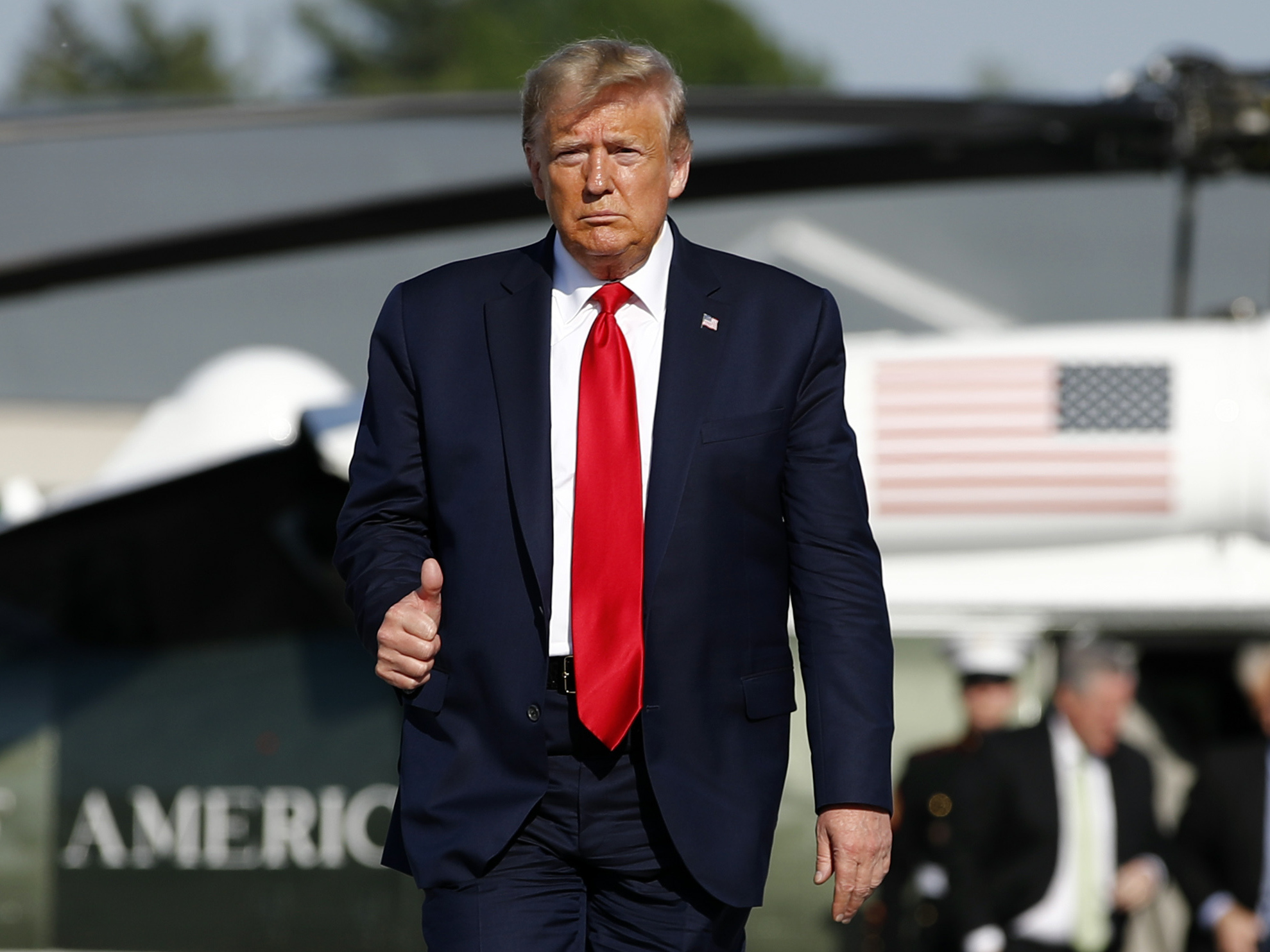 caption: President Trump, shown here on Friday in Bangor, Maine, is questioning the NFL commissioner's stance on player protests.