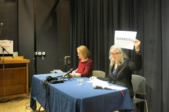 caption: Mayoral candidates Jenny Durkan (left) and Cary Moon (right) enjoy the lightening round