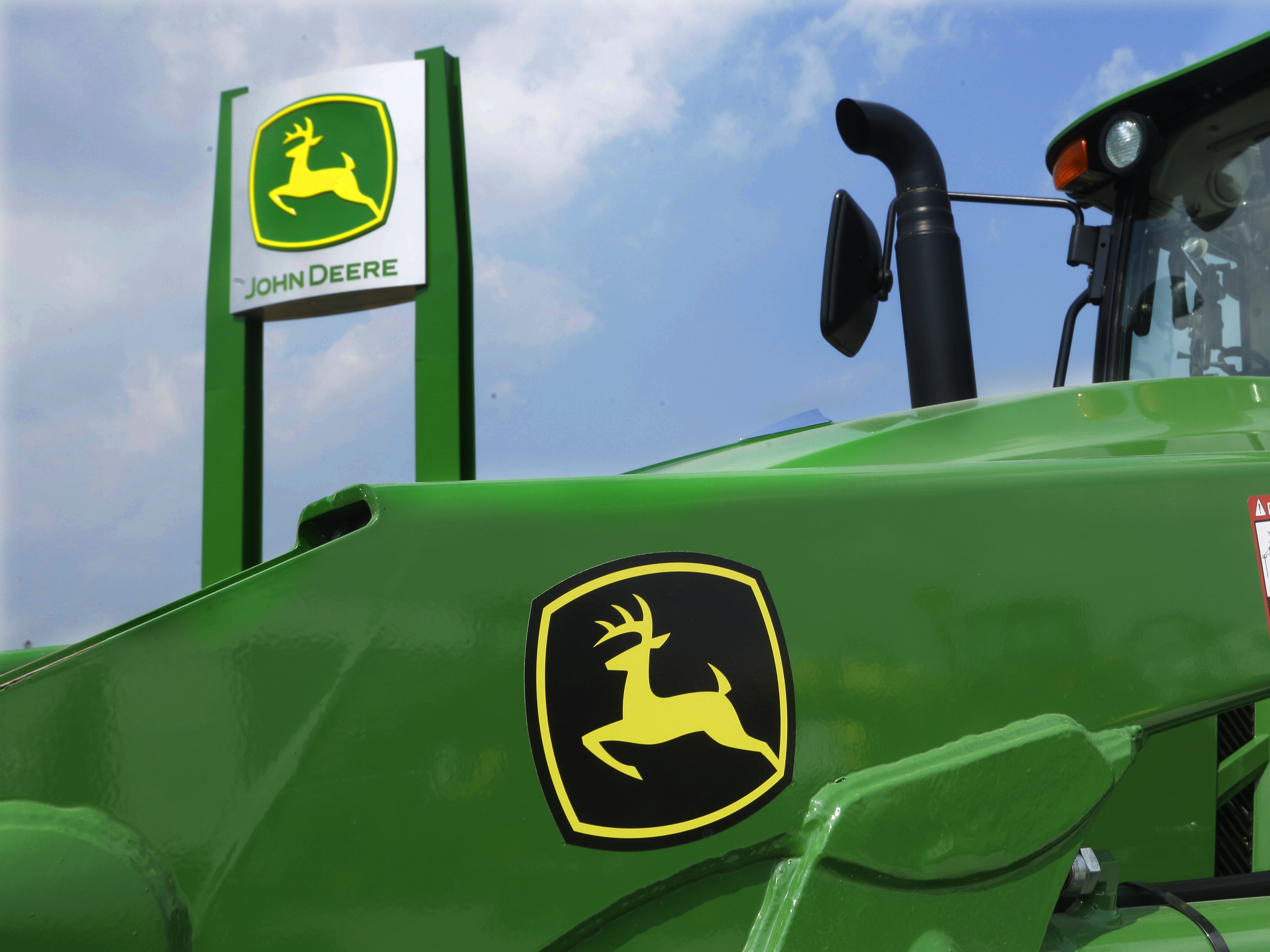 caption: John Deere is accused of illegally restricting farmers' ability to repair tractors and other equipment in a lawsuit filed by the Federal Trade Commission along with two states.