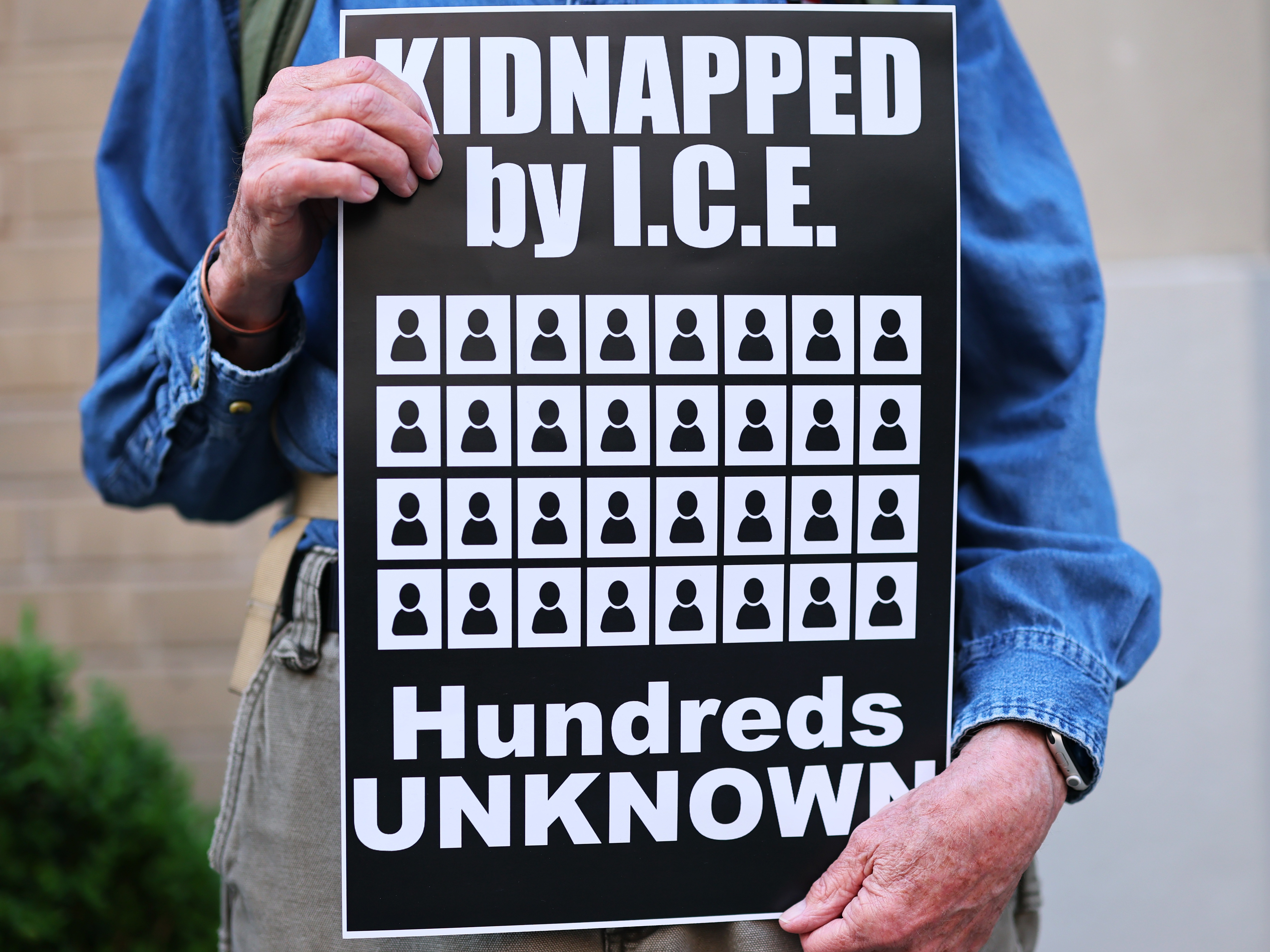 caption: Demonstrators gather to protest on Thursday against the deportation of immigrants to El Salvador outside the Permanent Mission of El Salvador to the United Nations in New York City.