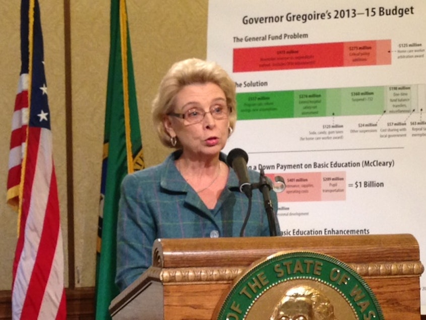 caption: In this 2012 file photo, then Gov. Chris Gregoire talks about the state budget. During the Great Recession, Democrats largely addressed plummeting revenues through budget cuts instead of tax hikes. The response to the COVID-19 recession may be different.