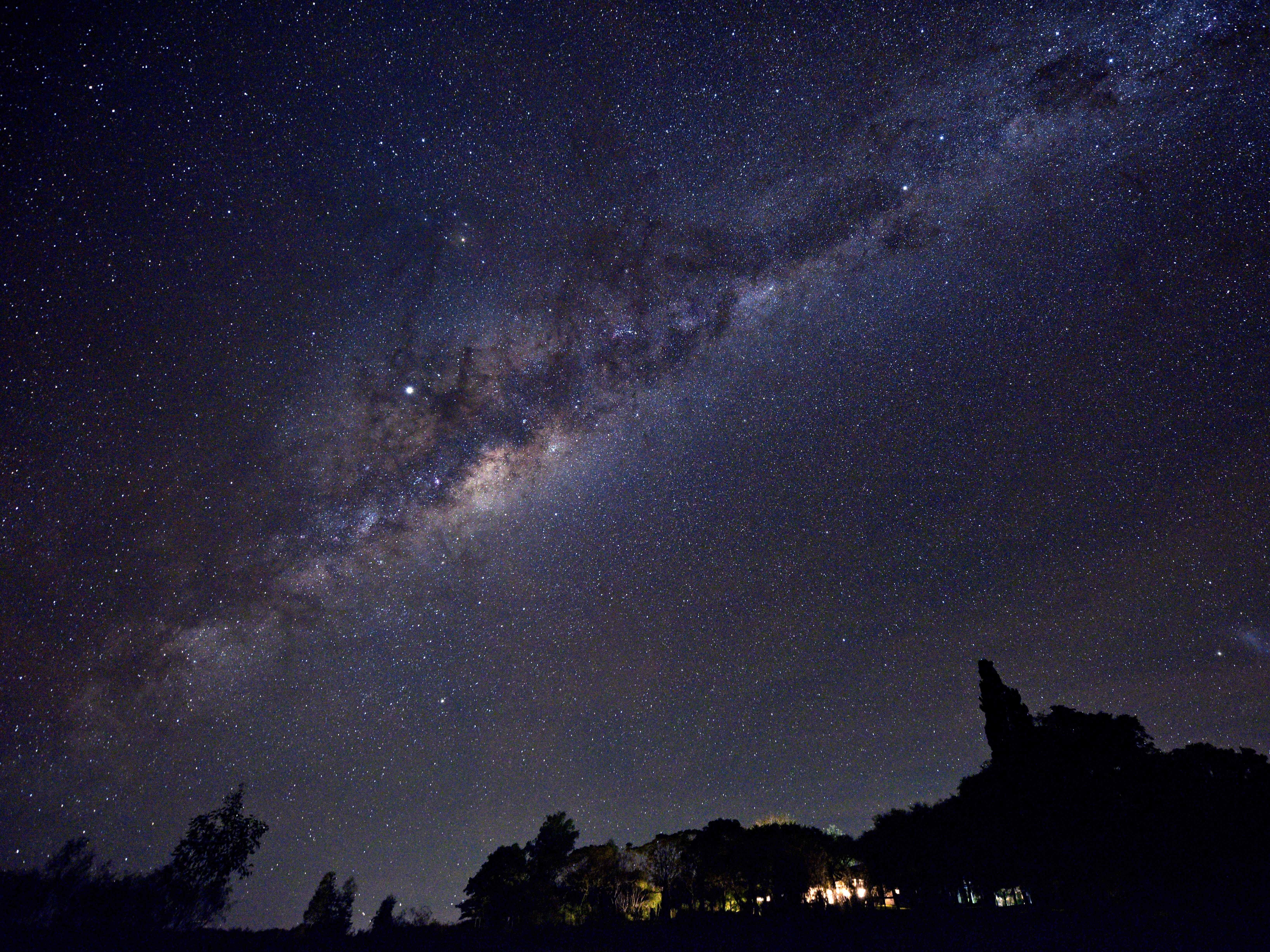 caption: Jupiter, the brightest spot near the middle of this image, will be a standout this week.