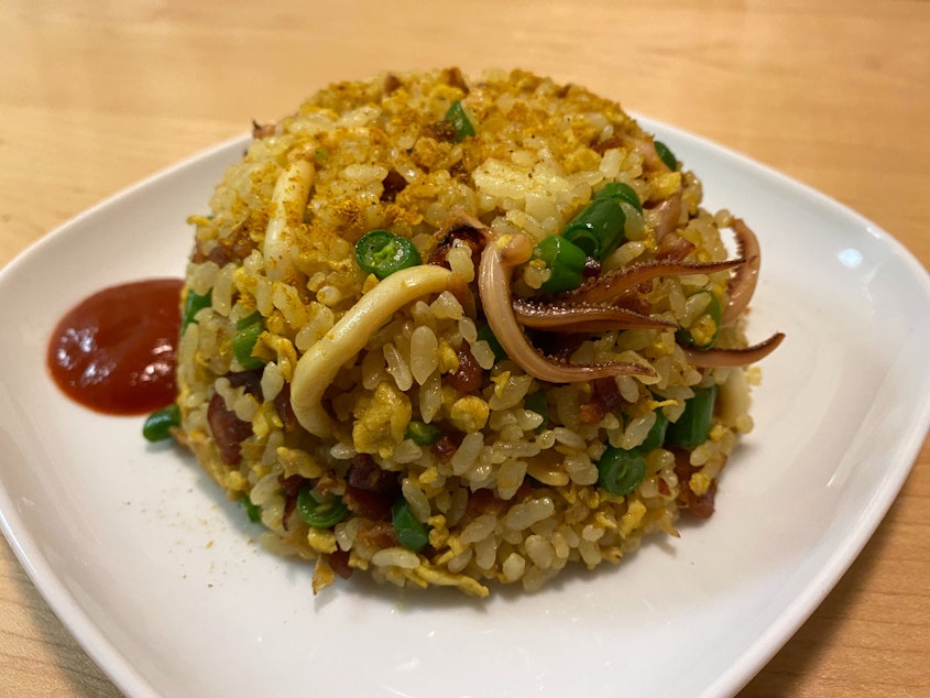 caption: Jordan Lock made curry squid fried rice for the meal exchange.