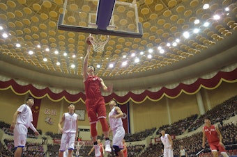caption: A joint China-North Korea basketball game in Pyongyang in October.