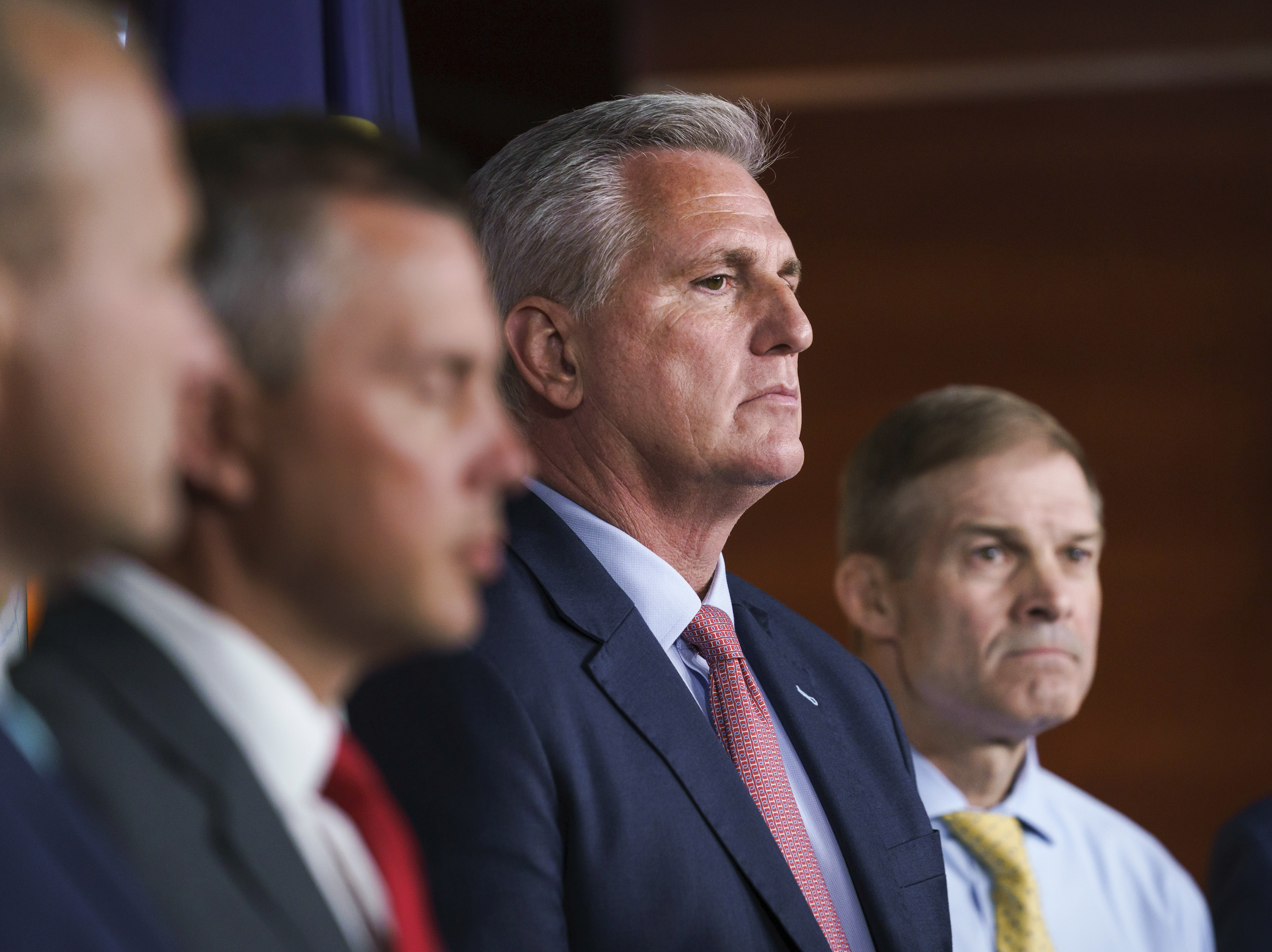 caption: House Minority Leader Kevin McCarthy, R-Calif., center, joined at right by Rep. Jim Jordan, R-Ohio, pause during a news conference on July 21, 2021.