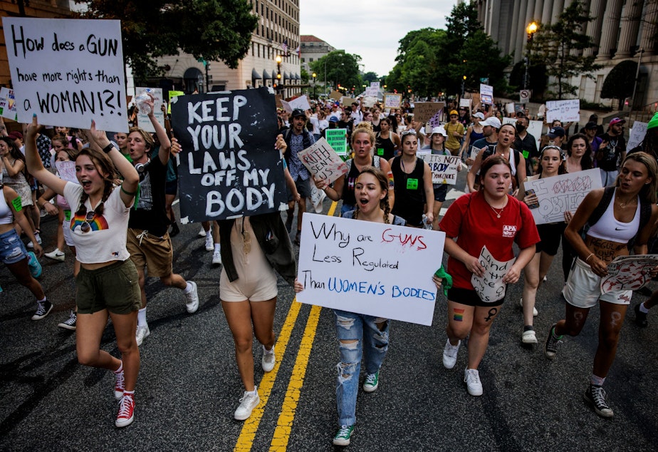 caption: Abortion rights activists protest in Washington, DC, on June 26, 2022, two days after the US Supreme Court scrapped half-century constitutional protections for the procedure.