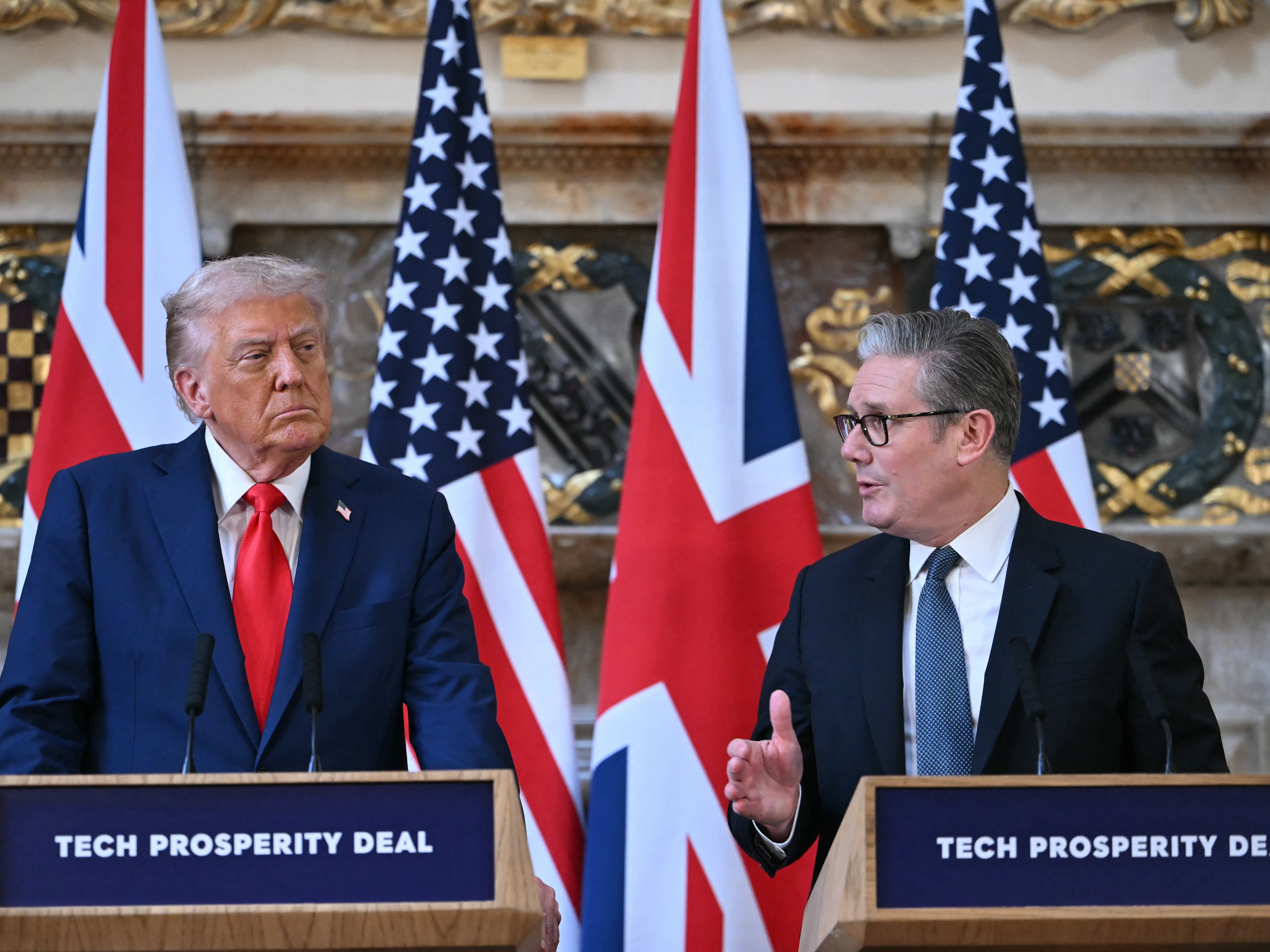 caption: Britain's Prime Minister Keir Starmer (R) and President  Trump (L) attend a joint press conference following their meeting at Chequers, in Aylesbury, central England, on Sept. 18 on the second day of the US President's second State Visit.