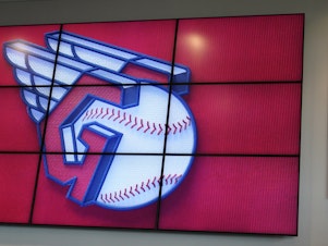 caption: The new Cleveland MLB logo is displayed on July 23 in Cleveland. Known as the Indians since 1915,the team will be called Guardians starting next season.