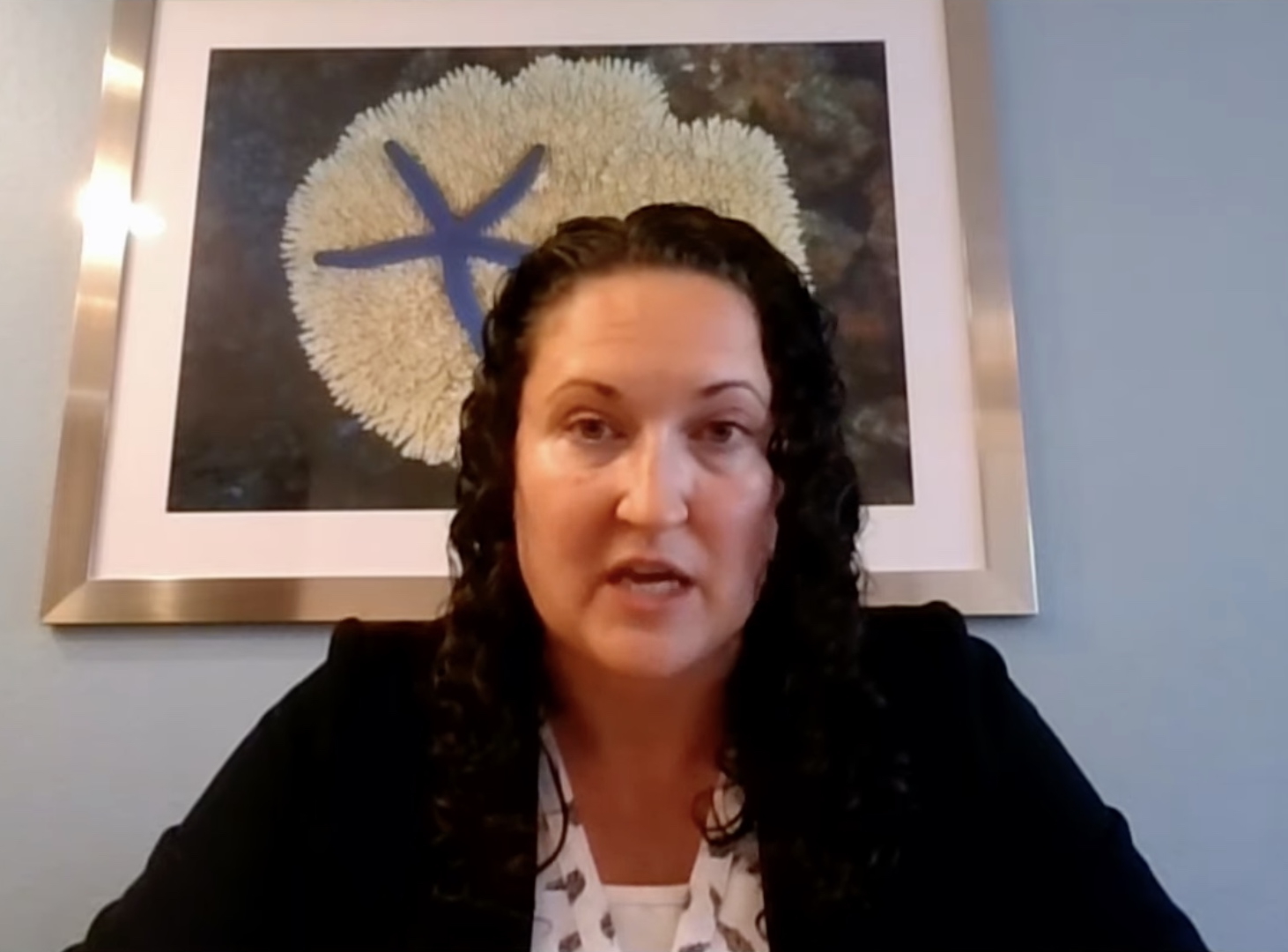 caption: King County Department of Community and Human Services Director Kelly Rider addresses the King County Council via video on Aug. 27, 2025.