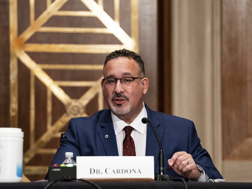 caption: President Biden's education secretary nominee, Miguel Cardona, appeared before the Senate Health, Education, Labor and Pensions Committee on Wednesday.
