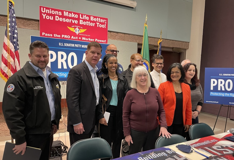 caption: Marty Walsh (2nd from left), Patty Murray (Front, Center) and Pramila Jayapal (Center right) pose with labor organizers in Seattle on March 25, 2022