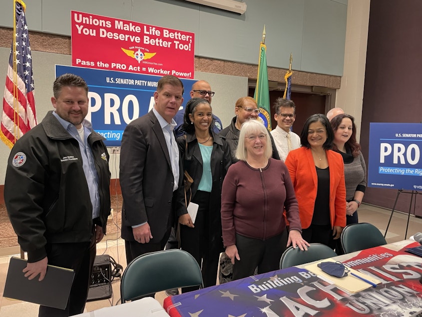 caption: Marty Walsh (2nd from left), Patty Murray (Front, Center) and Pramila Jayapal (Center right) pose with labor organizers in Seattle on March 25, 2022