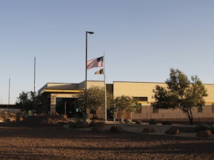caption: The entrance of a Border Patrol station in Clint, Texas. U.S. Customs and Border Protection said the agency is removing children from the facility following reports of unsanitary conditions inside.