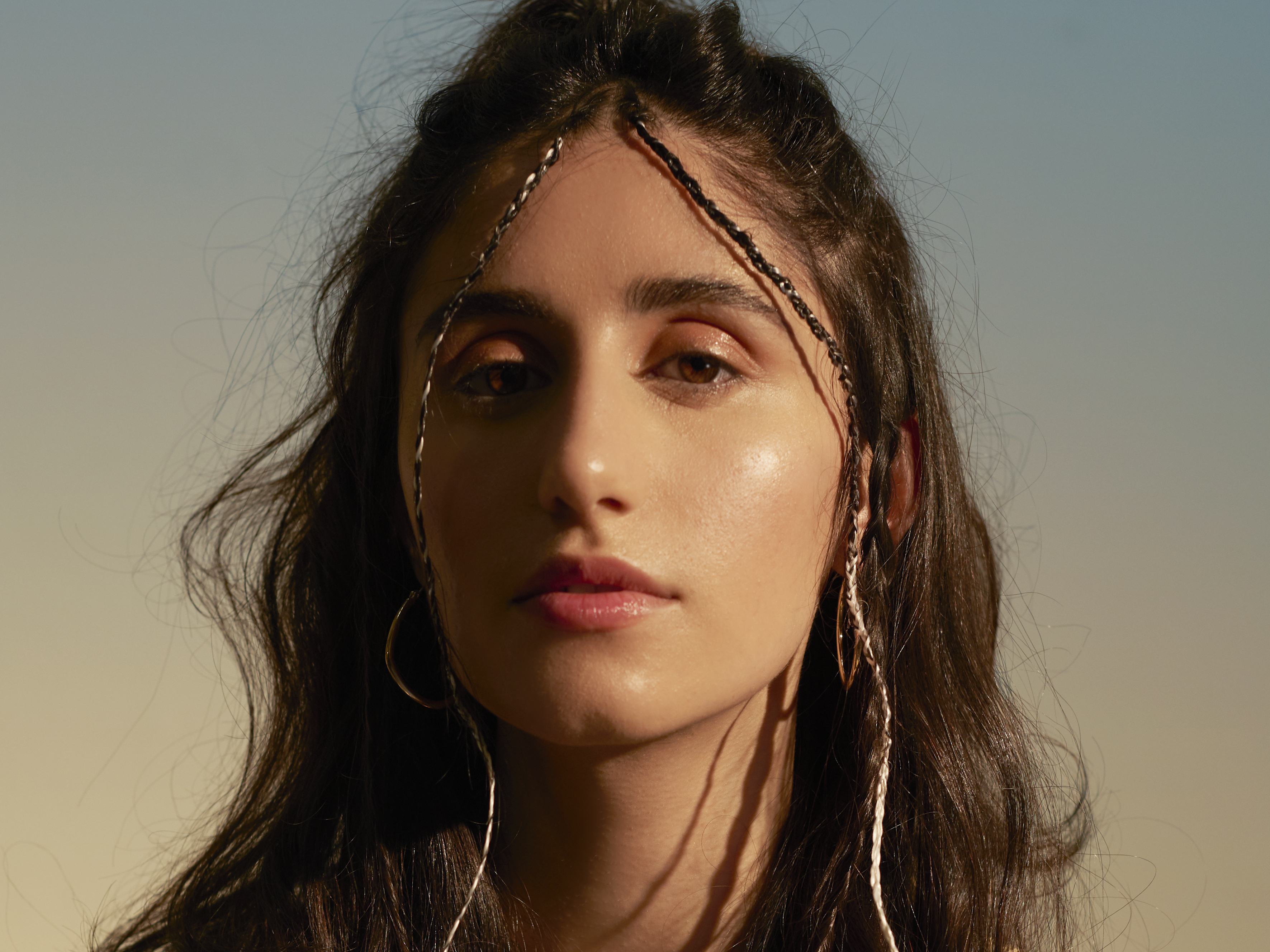 caption: Naaz Mohammad, 21, has become a star in the Netherlands, where she was born. She had to convince her Kurdish parents, who fled their home during the Gulf War three decades ago, to pursue music.