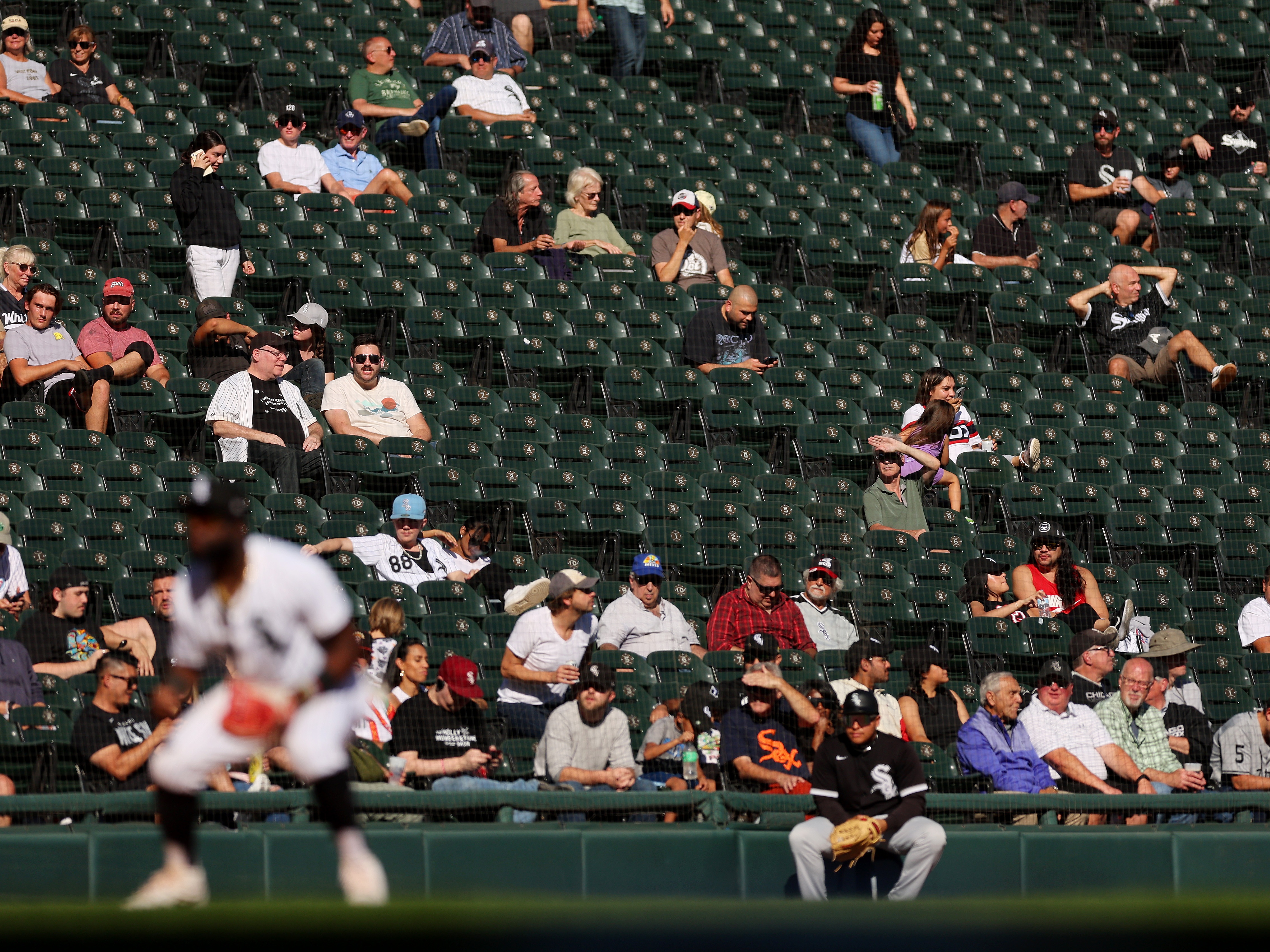 caption: Many Chicago White Sox fans admitted they hoped the team would break the record — most losses in a season in modern baseball history — by losing their 121st game. Instead, Chicago swept the Angels and now, with a record of 39-120, heads to Detroit for its final series of the year. 