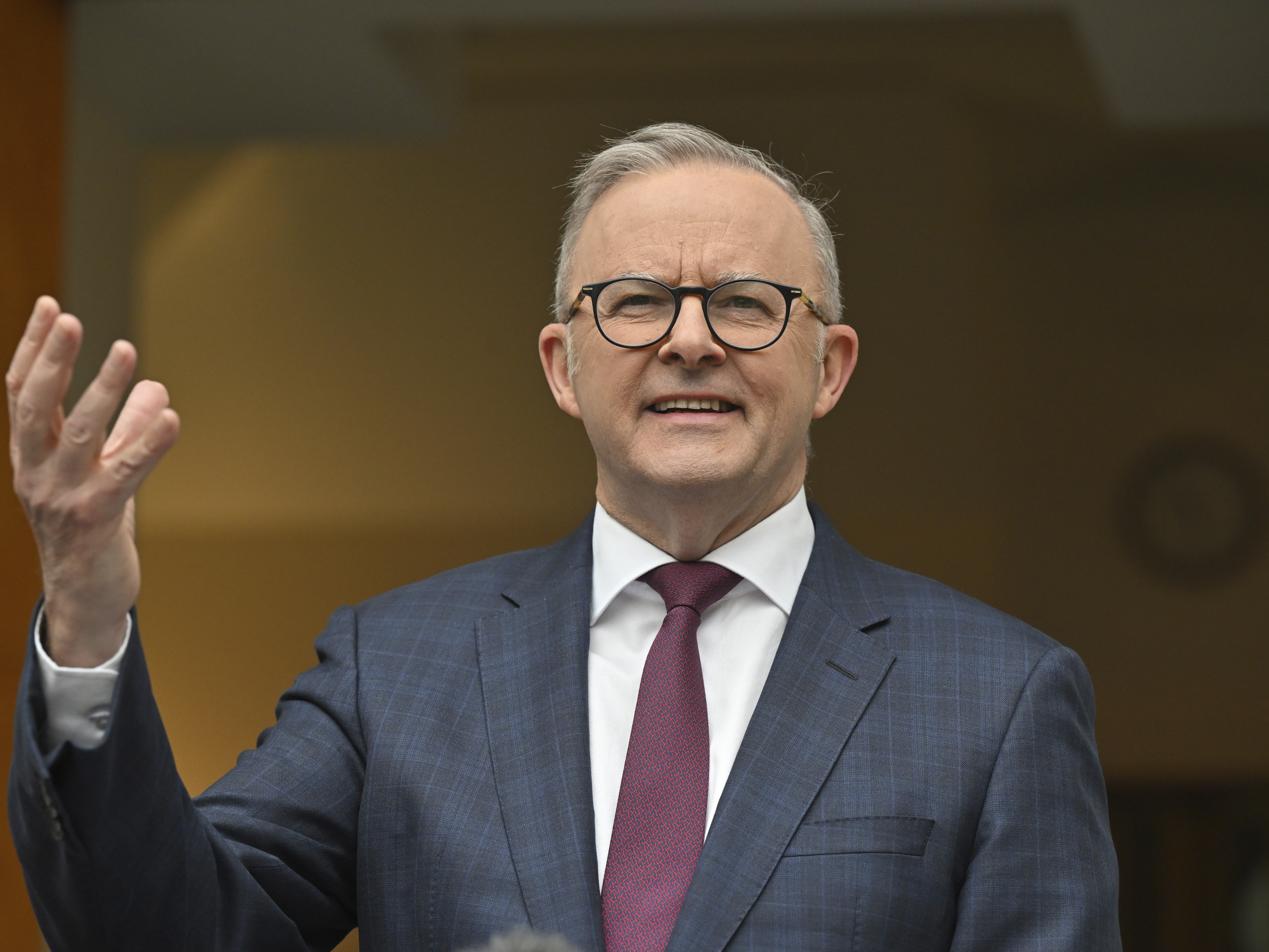 caption: Australian Prime Minister Anthony Albanese discusses legislation that would male 16 years as a minimum age for children to use social media at a press conference in Canberra, Thursday, Nov. 7, 2024.
