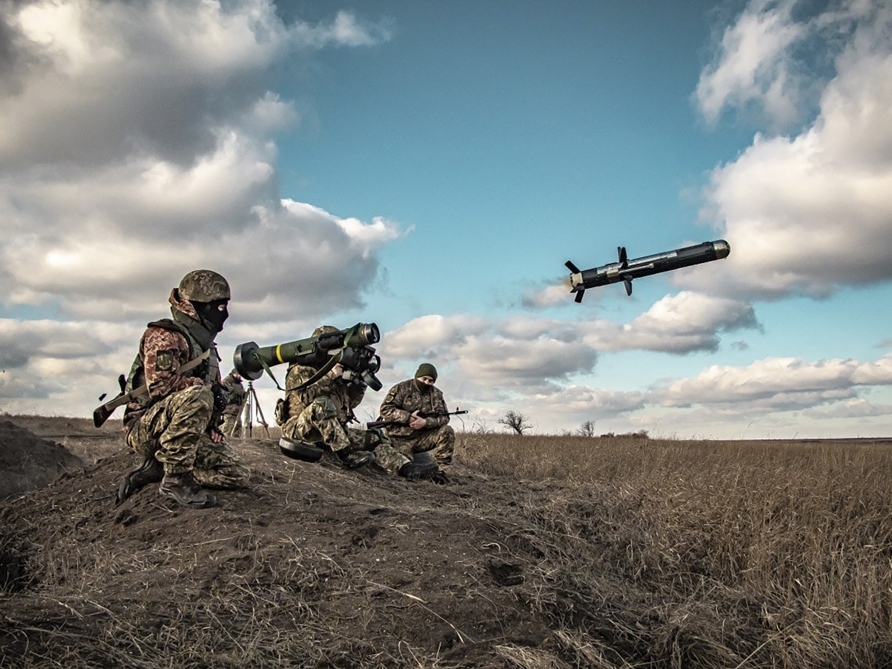 caption: In an image released by Ukrainian Defense Ministry Press Service, Ukrainian soldiers use a launcher with U.S. Javelin missiles during military exercises in Donetsk region, Ukraine, on Thursday.