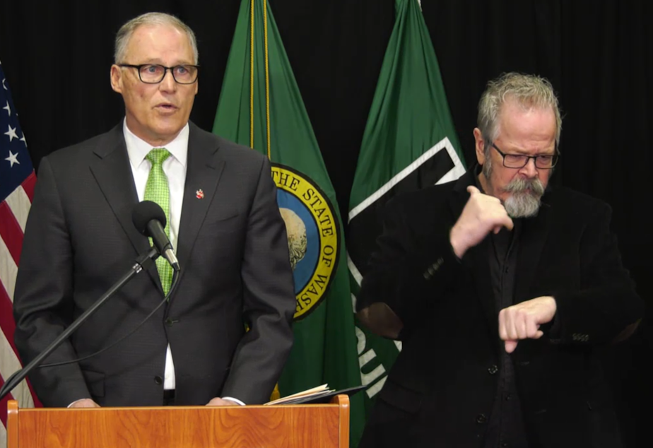 caption: Gov. Jay Inslee announces a ban on large events and gatherings of more than 250 people in King, Snohomish, and Pierce counties on Wednesday, March 11, 2020.