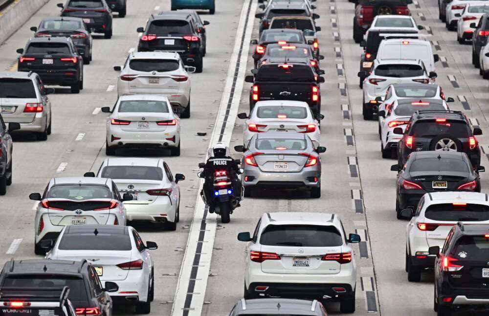 caption: Car prices have come down consistently over 10 months after a spike during and after the pandemic sent prices skyrocketing. But insurance and maintenance costs are both up significantly from a year ago. (Frederic J. Brown/AFP via Getty Images)