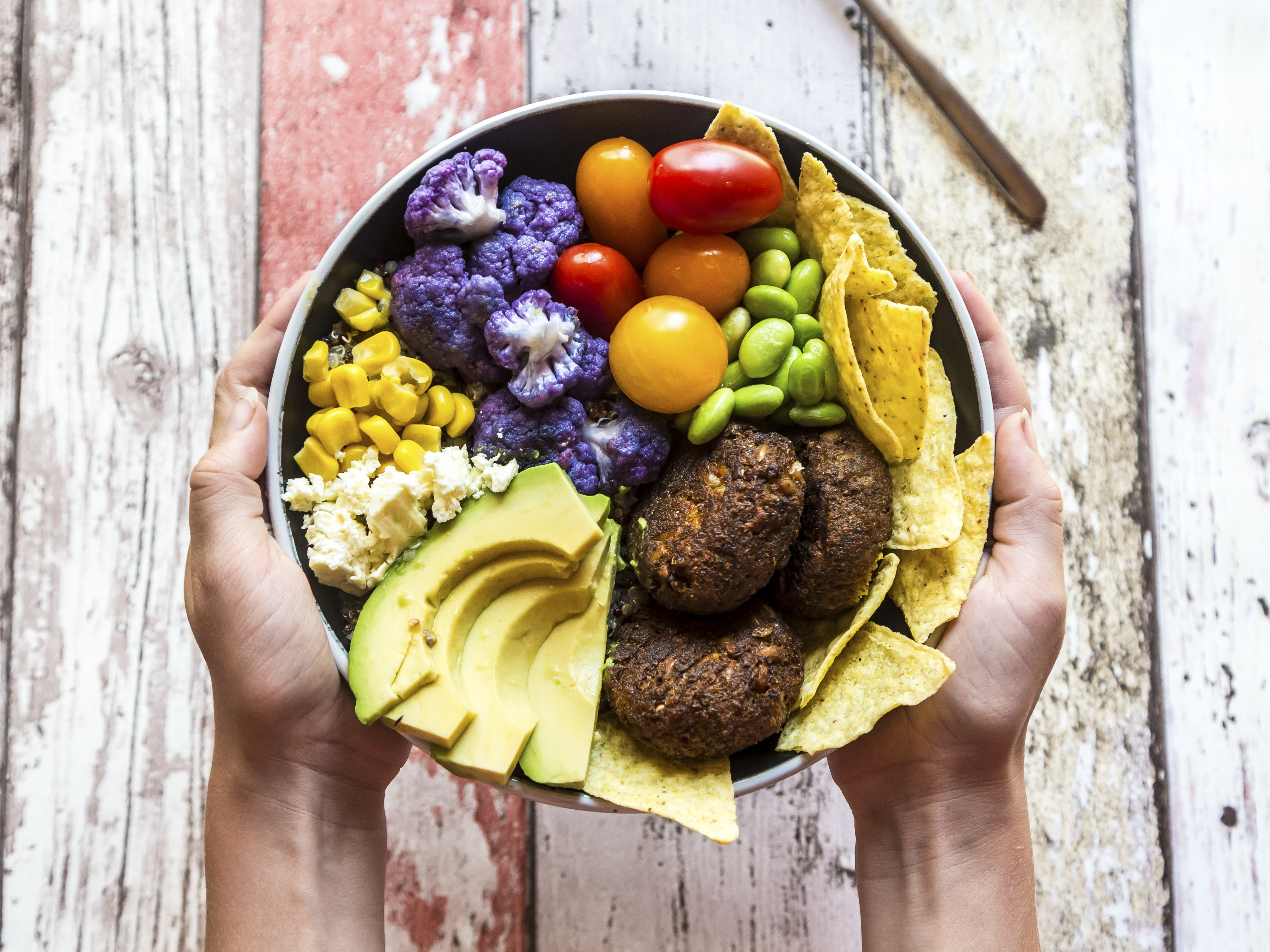 caption: To help protect the planet and promote good health, people should eat less than 1 ounce of red meat a day and limit poultry and milk, too. That's according to a new report from some of the top names in nutrition science. People should instead consume more nuts, fruits and vegetables, legumes, and whole grains, the report says. The strict recommended limits on meat are getting pushback.