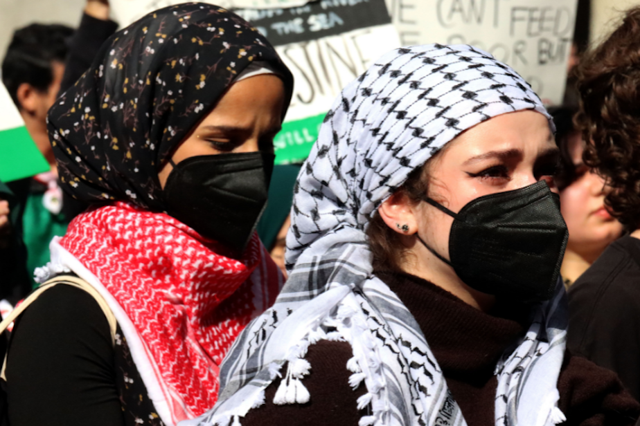 caption: “Day of Resistance, Protest for Palestine," a pro-Palestine demonstration, took place at the University of Washington's Red Square, Oct. 12, 2023. Many activists wore a Kuffiyeh, a symbol of Palestinian resistance.