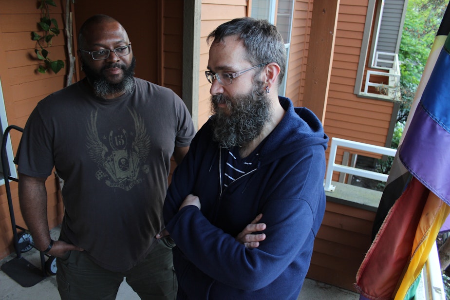 caption: Robert Darden, left, and Anthony Fox moved to Seattle from Nashville. They say they are adamant about living within Seattle city limits, although escalating rents have made that increasingly tough.