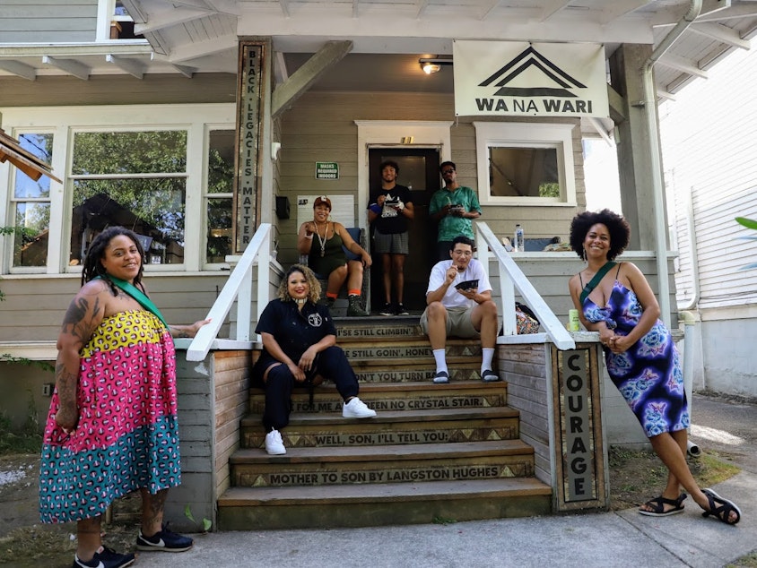 caption: From left, Wa Na Wari curator Elisheba Johnson, Chef Lakea Osias, Soulma Ayers-Hardiman are part of Love Offering, a community meal program in Seattle's Central District.