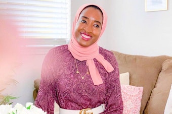 caption: Fatima Ibrahim wears Haute Hijab's recycled chiffon hijab on Eid al-Fitr.