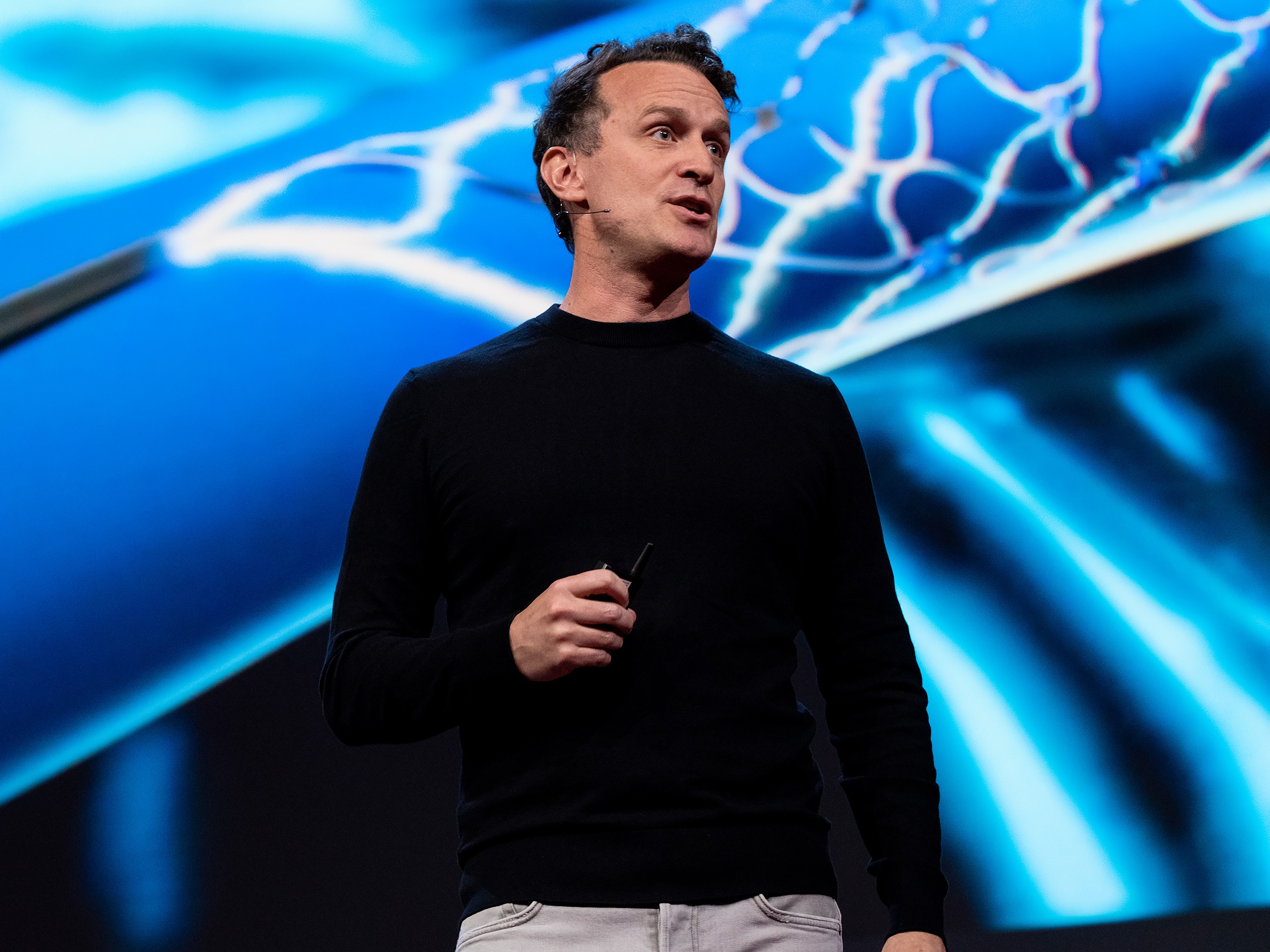 caption: Thomas Oxley speaks at TED2022