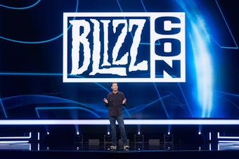 caption: Blizzard Entertainment President Mike Ybarra speaks at BlizzCon. (Business Wire via AP)