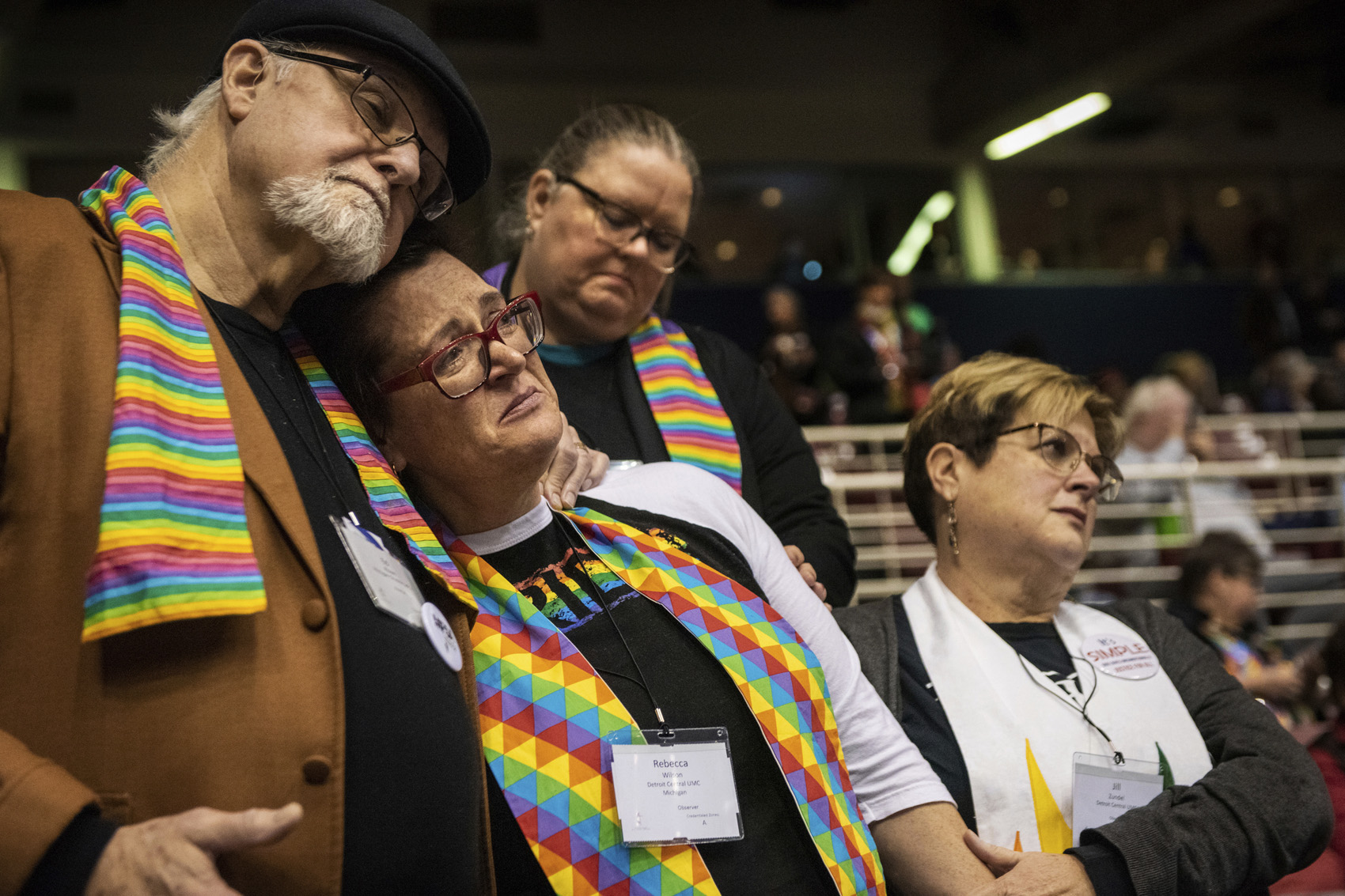 caption: Ed Rowe, left, Rebecca Wilson, Robin Hager and Jill Zundel, react to the defeat of a proposal that would allow LGBT clergy and same-sex marriage within the United Methodist Church. (Sid Hastings/AP)