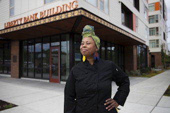 caption: Chef Kristi Brown poses for a portrait outside of the Liberty Bank Building at the intersection of 24th Avenue and East Union Street on Thursday, July 11, 2019, in Seattle. 