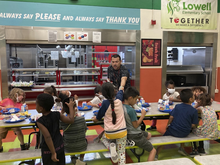 caption: Students finish their lunch at Lowell Elementary School in Albuquerque, N.M., on Aug. 22, 2023. A legislative proposal would ban six artificial food dyes in California schools.