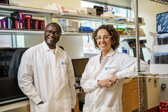 caption: Long-time collaborators Pardis Sabeti (right) of the Broad Institute and Christian Happi of the African Centre of Excellence for Genomics of Infectious Diseases in Nigeria, are developing an early-warning system that could flag an emerging pandemic .